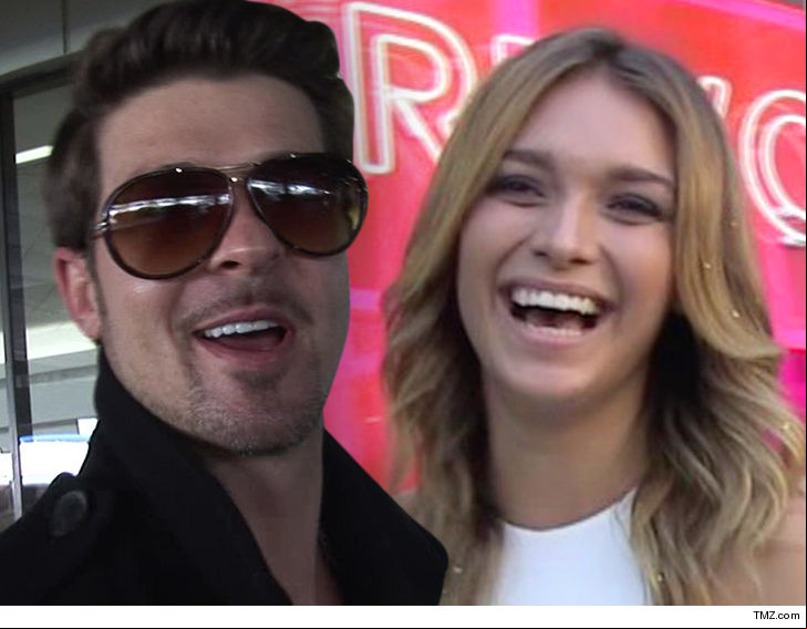 robin thicke is about to be a father again with a girlfriend who is barely able to legally drink